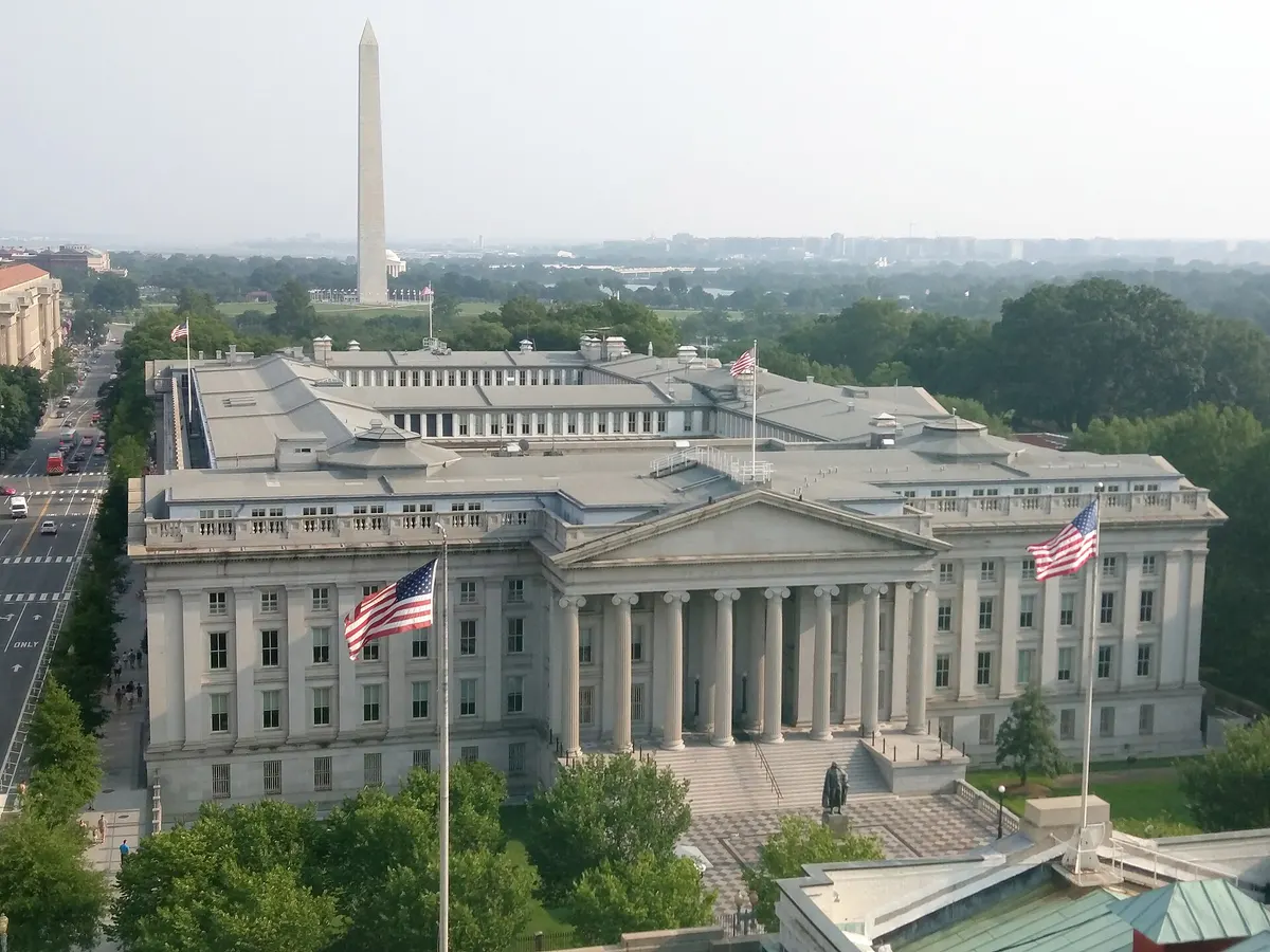 U.S. Treasury Building in Washington with the Washington Monument behind it (file photo)