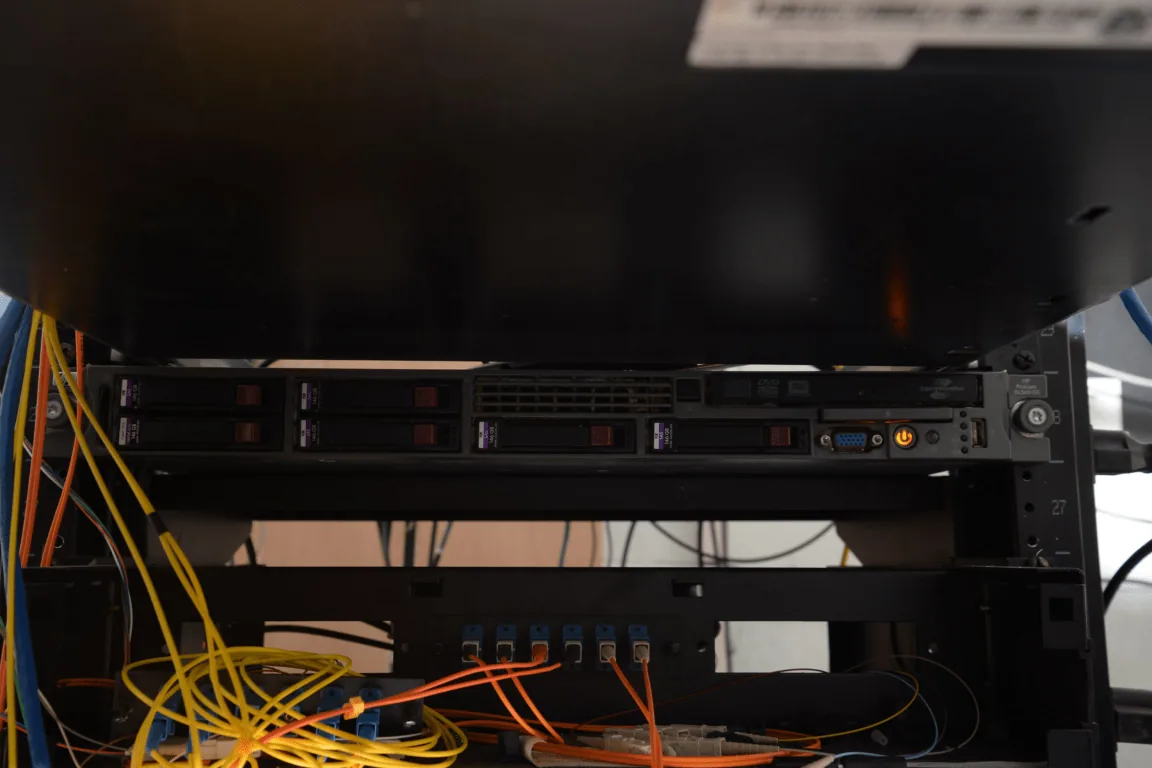 Server rack with hard drives and network cables in a data center (stock file photo)